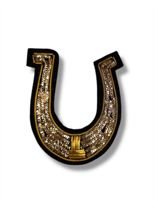 Broche fer a cheval