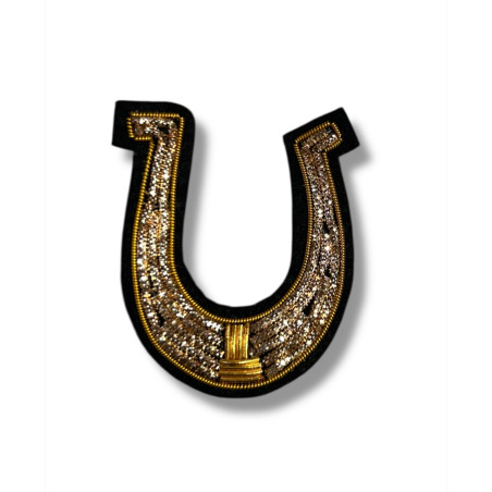 Broche fer a cheval
